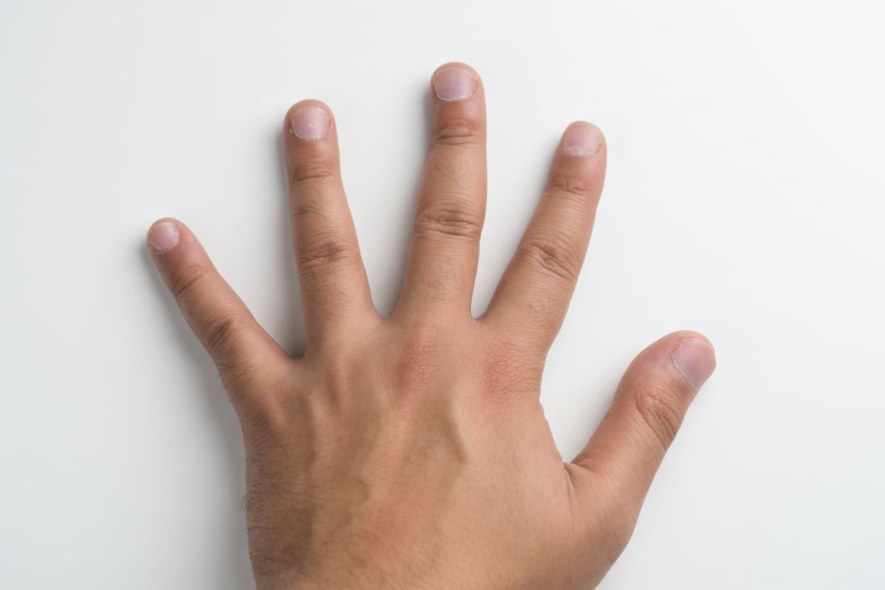 Hand wearing NBS™ nail covers